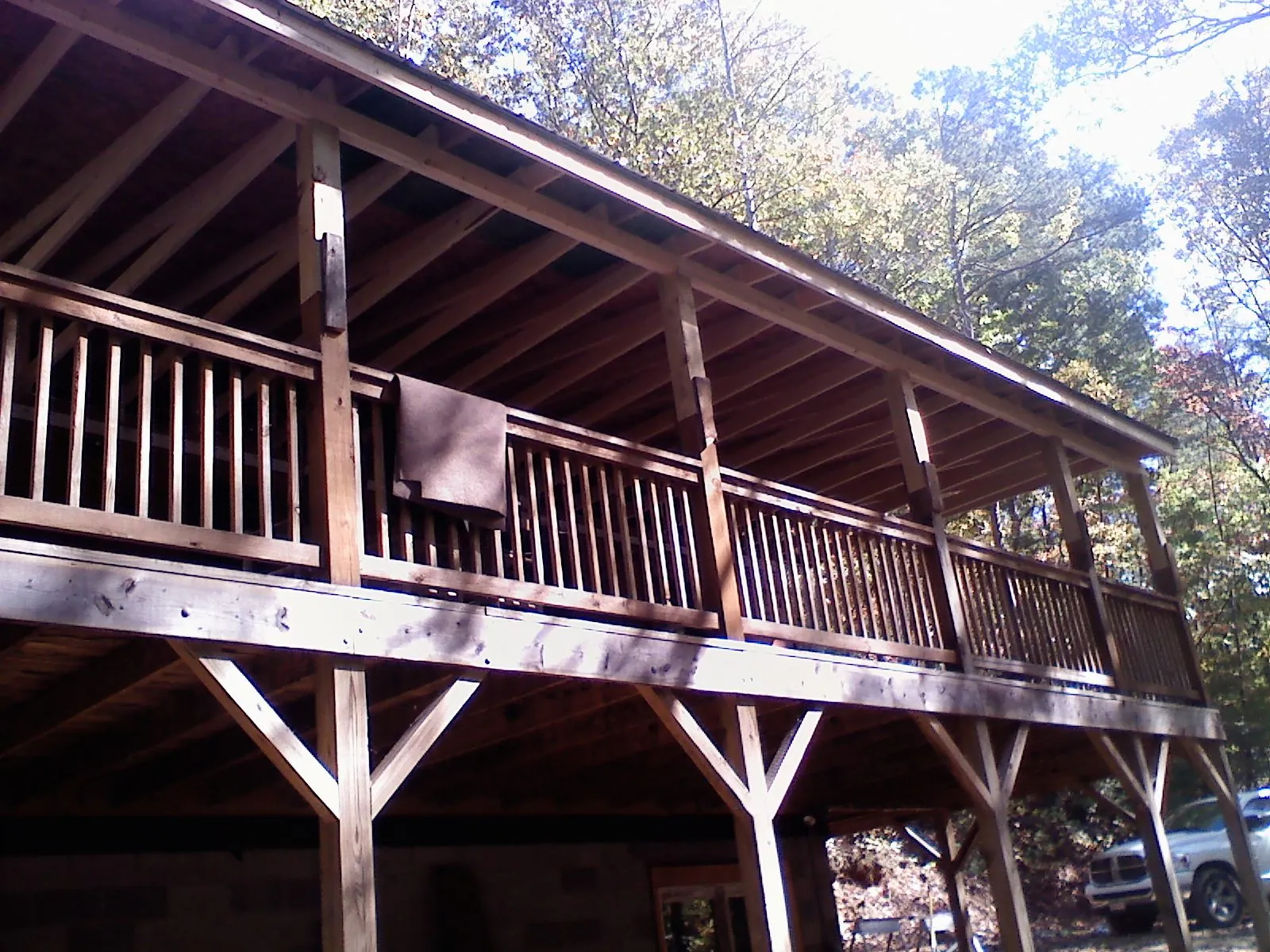 Timber framing under a new elevated porch and deck — Roof Leak Repair in Mount Royal by Roofing Brothers